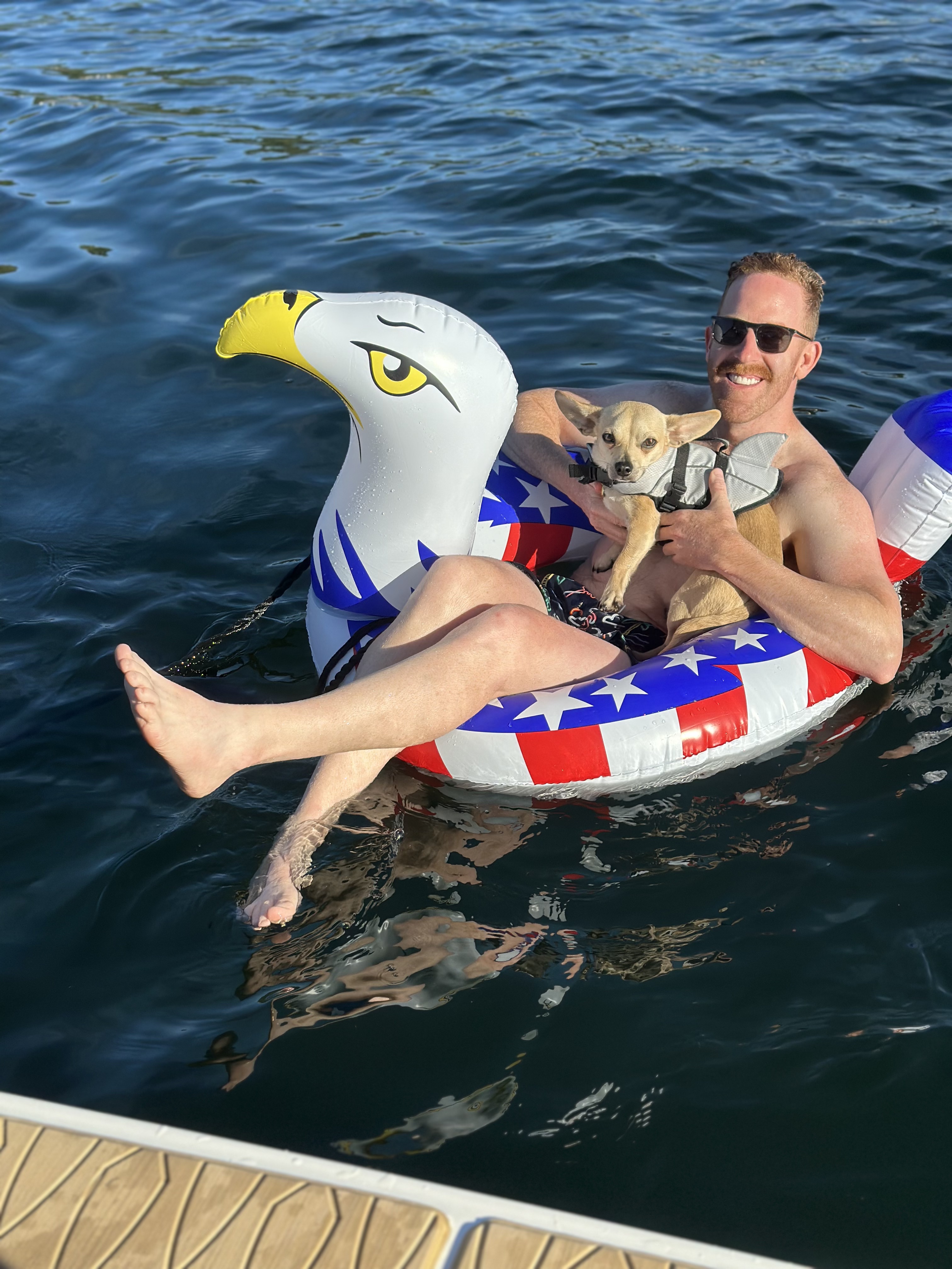 Captain Wes enjoying the water with his dog