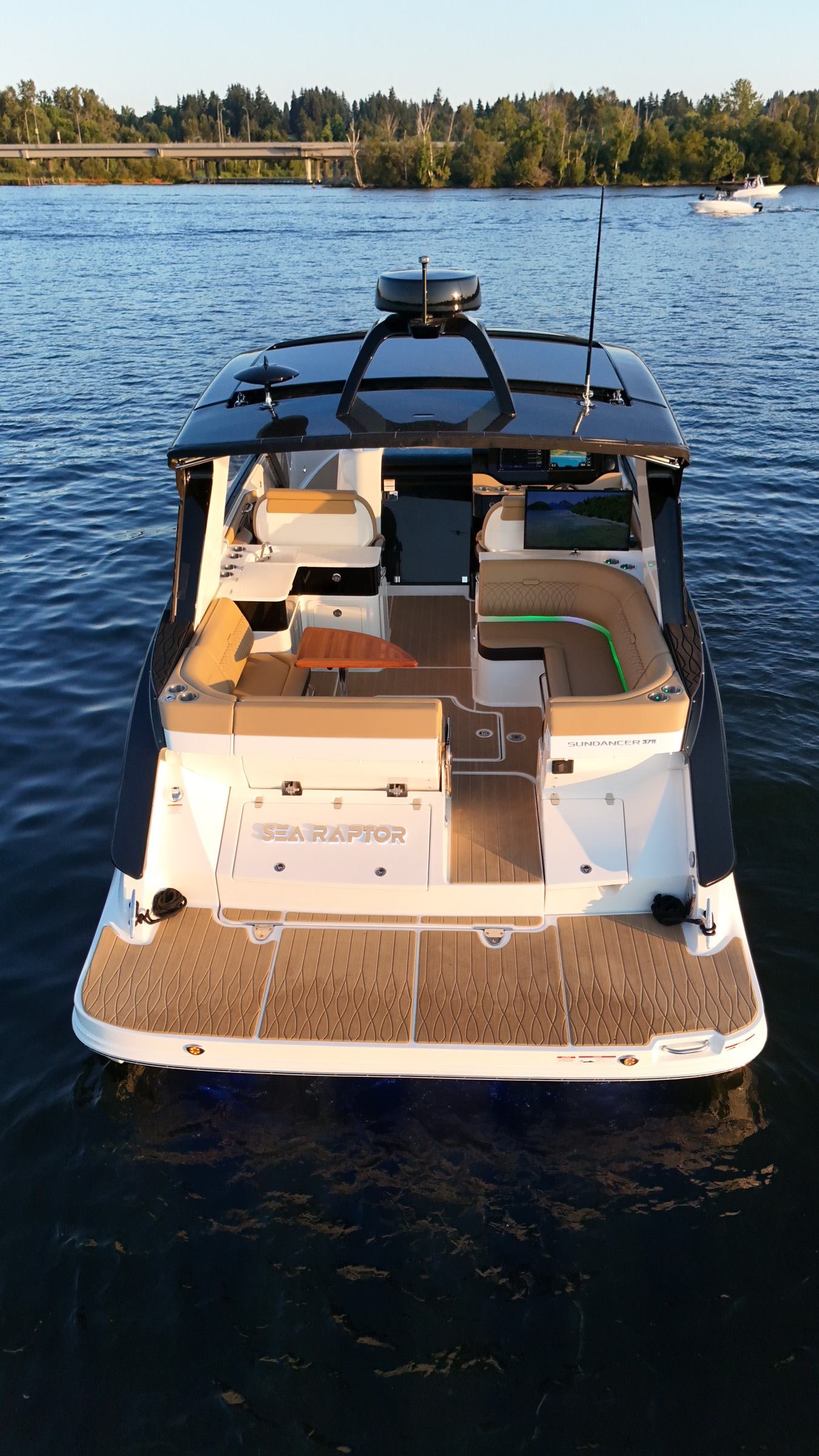Sea Raptor's swim platform and transom at golden hour